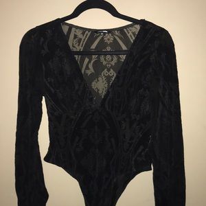 Black fashionnova bodysuit